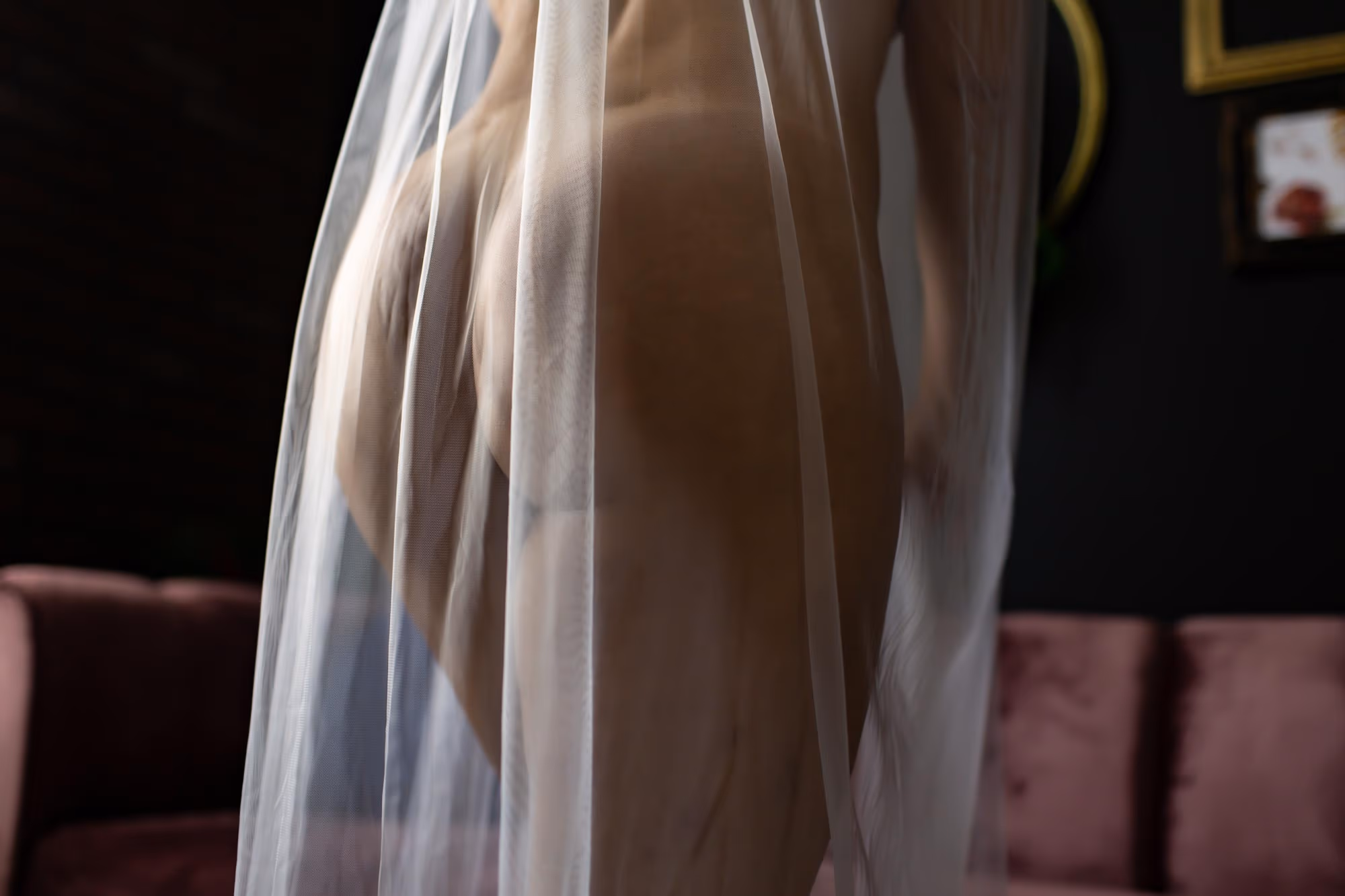 Image of nude woman with veil covering butt